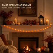 Marigold string lights decorating a warm fall fireplace mantel
